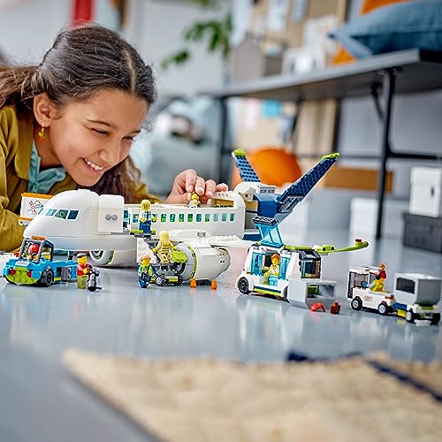 LEGO City Passenger Airplane Building Toy Set with Large Airplane, Passenger Bus, Luggage Truck, Container Loader, and 9 Minifigures V2511